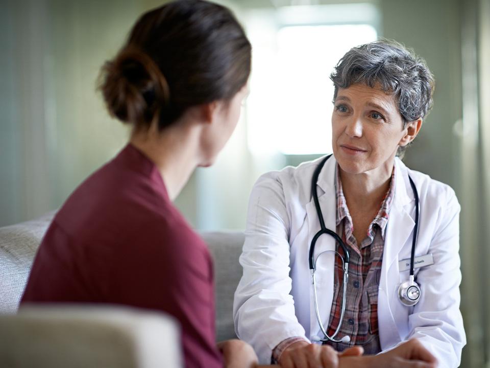 Doctor speaking to patient